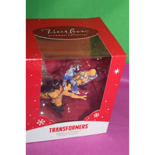 Load image into Gallery viewer, Carlton Heirloom Transformers Optimus Prime On Dinosaur 051F Holiday Ornament