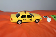 Load image into Gallery viewer, NYC New York City Yellow Ford Crown Victoria Taxi Cab With Parking Sign Toy