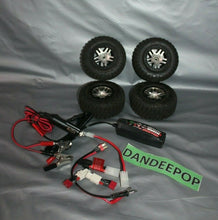 Load image into Gallery viewer, 4 Piece Traxxas R/C Truck Vehicle Tires With 2 Amp Fast Charger And Connectors