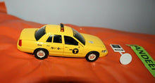Load image into Gallery viewer, NYC New York City Yellow Ford Crown Victoria Taxi Cab With Parking Sign Toy