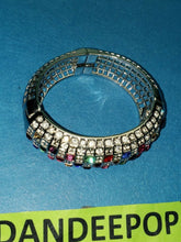 Load image into Gallery viewer, Silver Tone With Jewel Tone Crystals Open Grate Magnetic Chunky Bangle Bracelet