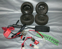 Load image into Gallery viewer, 4 Piece Traxxas R/C Truck Vehicle Tires With 2 Amp Fast Charger And Connectors