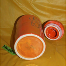 Load image into Gallery viewer, Rae Dunn Crow's Bones Orange Luster Finish Ceramic Canister Halloween Decor
