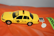 Load image into Gallery viewer, NYC New York City Yellow  Ford Crown Victoria Taxi Cab With Parking Sign Toy
